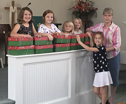 Children of Grace Fellowship Academy getting ready to send Samaritan Purse Operation Shoe Box to children around the world.